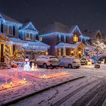 A glowing village at night during Christmas