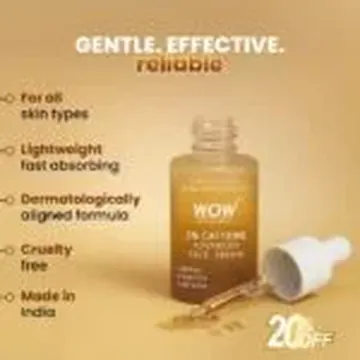 Golden serum bottle with dropper and spilled drops on beige background with promotional text