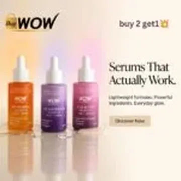 Three serum bottles in orange purple and pink with droppers on a reflective surface with promotional text