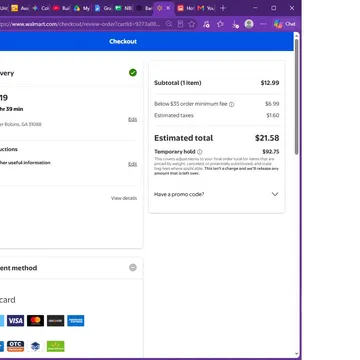 Walmart checkout screen displaying delivery info and payment methods for an order totaling $21.58