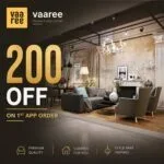 Modern living room with gray sofa dark wood floor and chandelier with discount promotion overlay