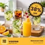 Six glasses of colorful drinks with citrus and herbs on a wooden tray with sale sticker