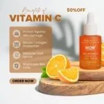 Orange vitamin c serum bottle with fresh orange slices on wooden board for skincare promotion