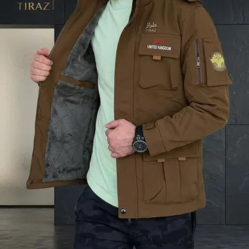 Man wearing brown winter jacket with fleece lining and multiple pockets